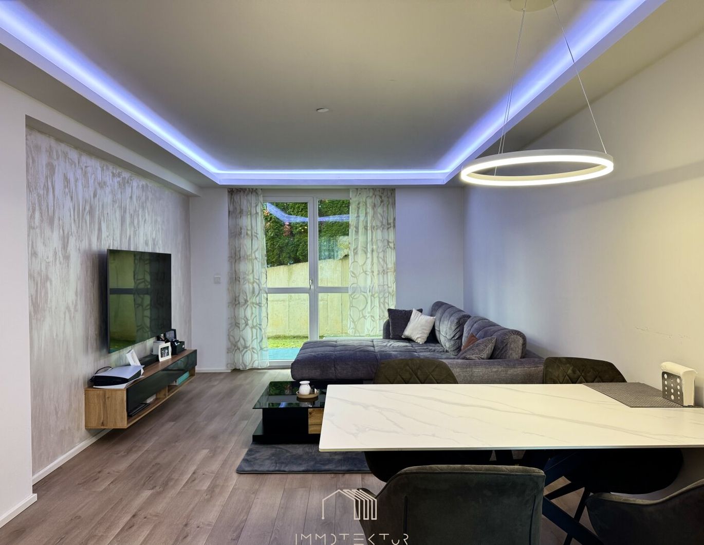 EIGENGARTEN: Modernisierte 2-Zimmer-Wohnung mit Tiefgarage und großem Kellerabteil