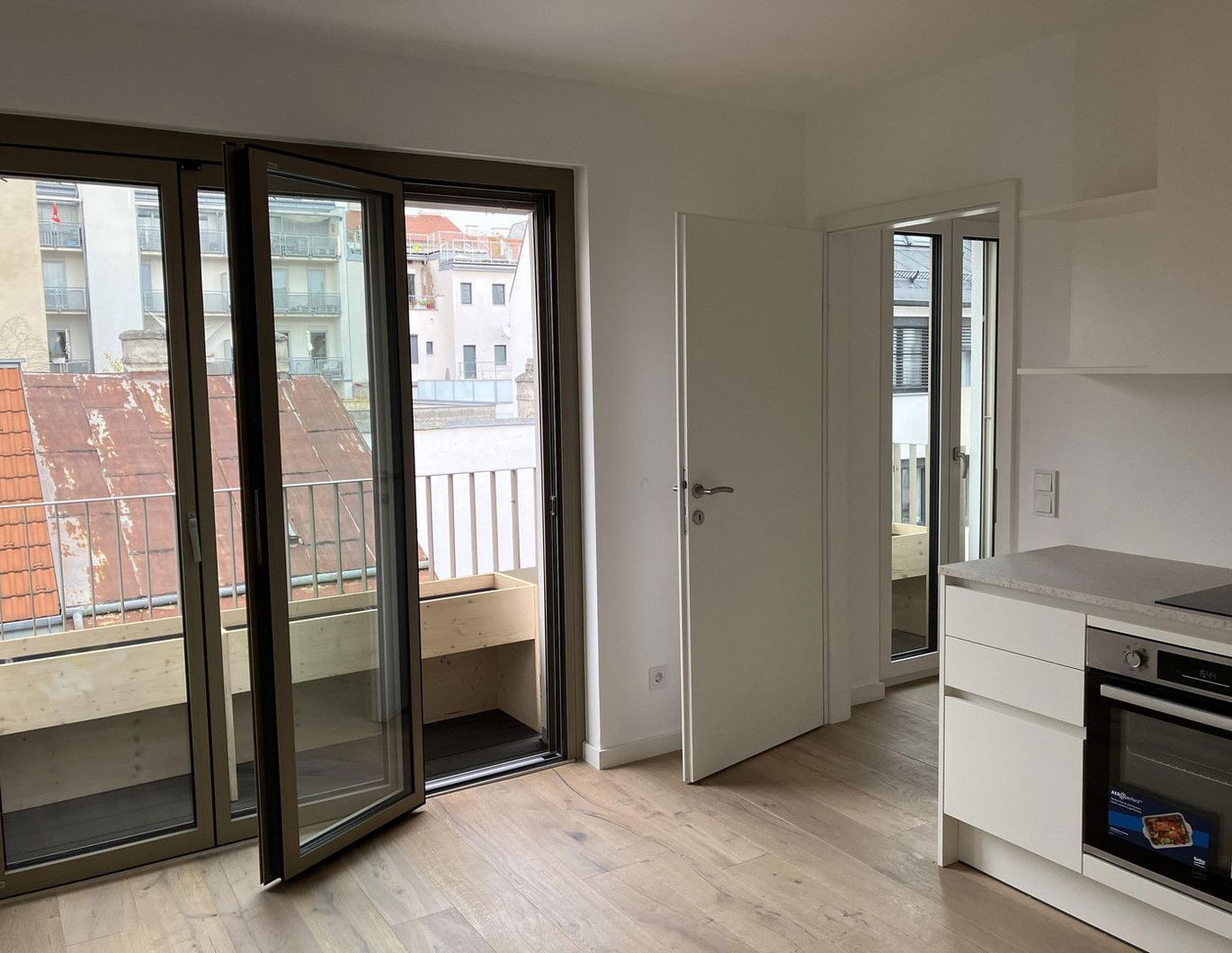 Erstbezug: Top-ausgestattete 2-Zimmer Wohnung mit Fußbodenheizung, Klimaanlage & Balkon