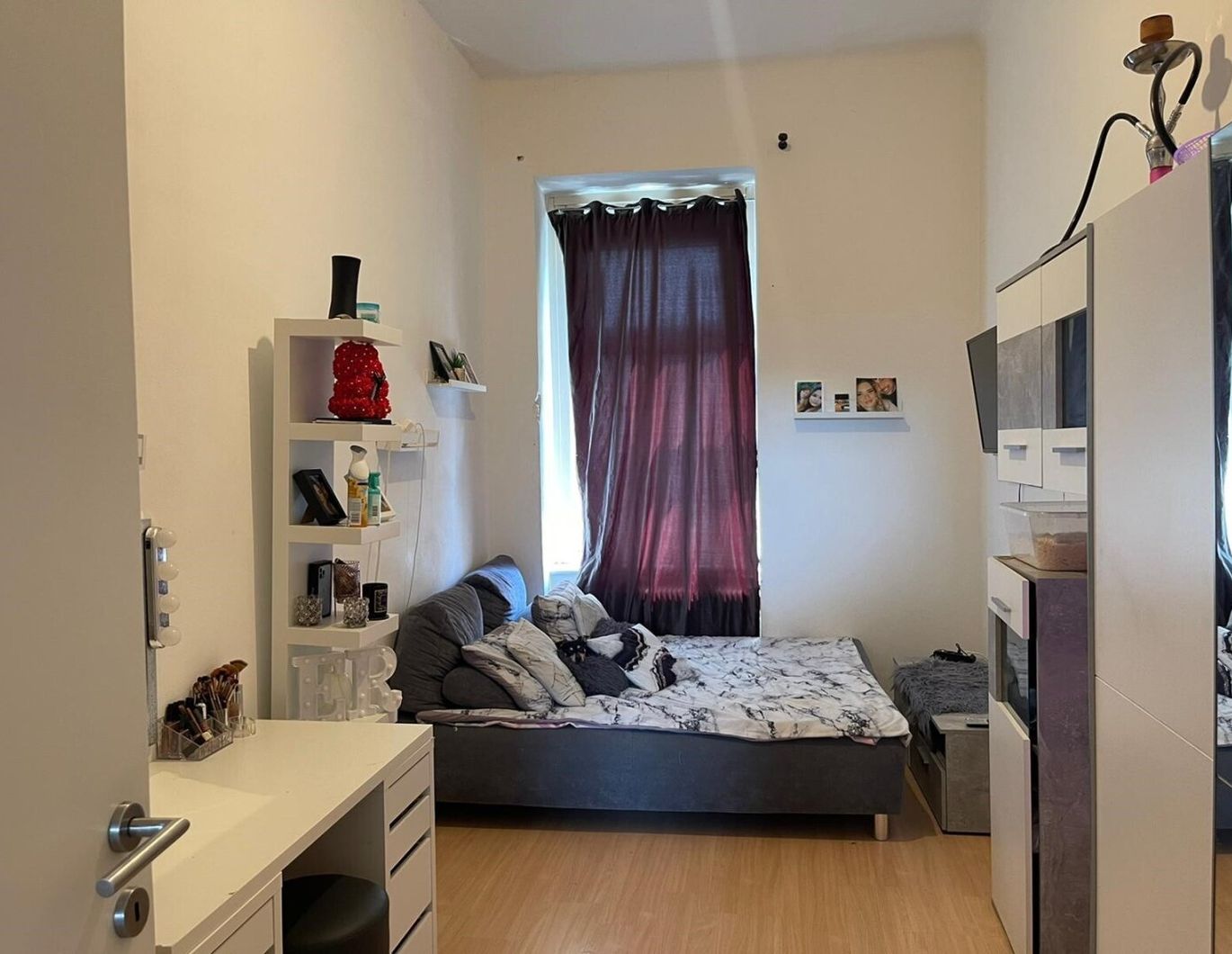 Sanierungsbedürftige 2,5-Zimmer-Wohnung mit Gemeinschaftsbalkon