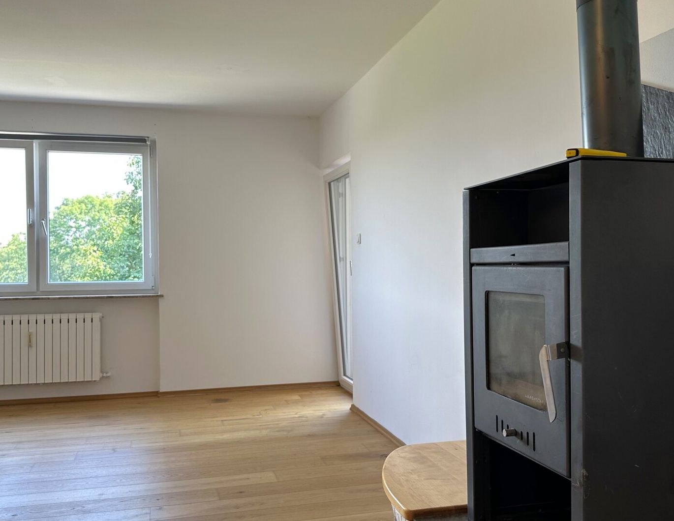 Bestbieterverfahren - Wohnung mit Holzofen und Eigengarten