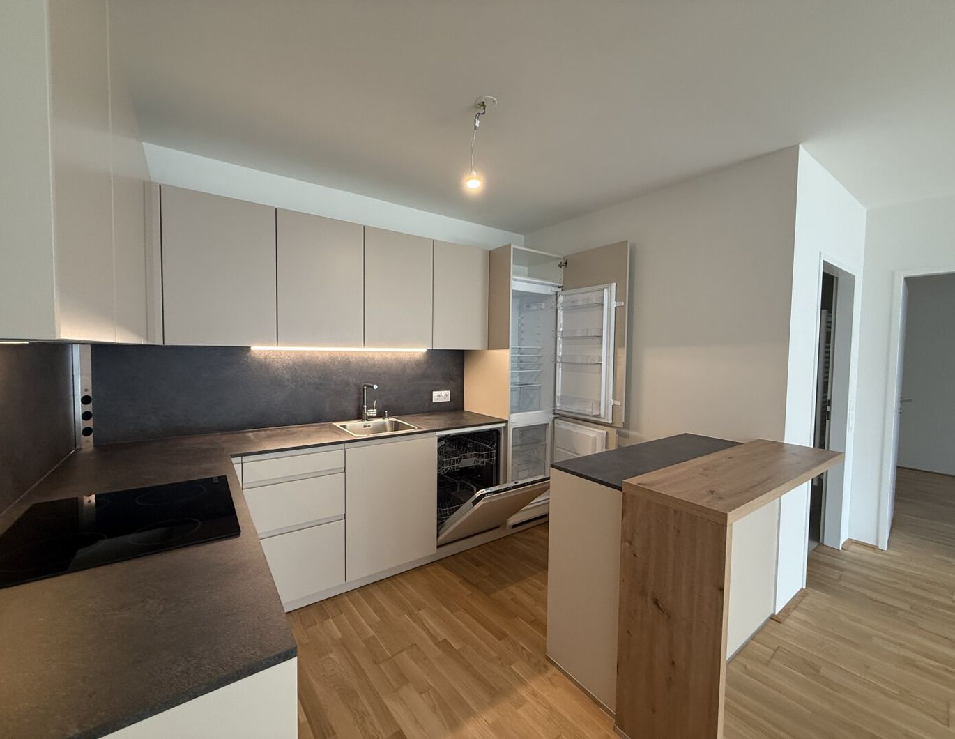 Neubau Erstbezug I Nähe Donau I Fußbodenheizung I Balkon I Maßküche I Tiefgarage I Fernwärme I