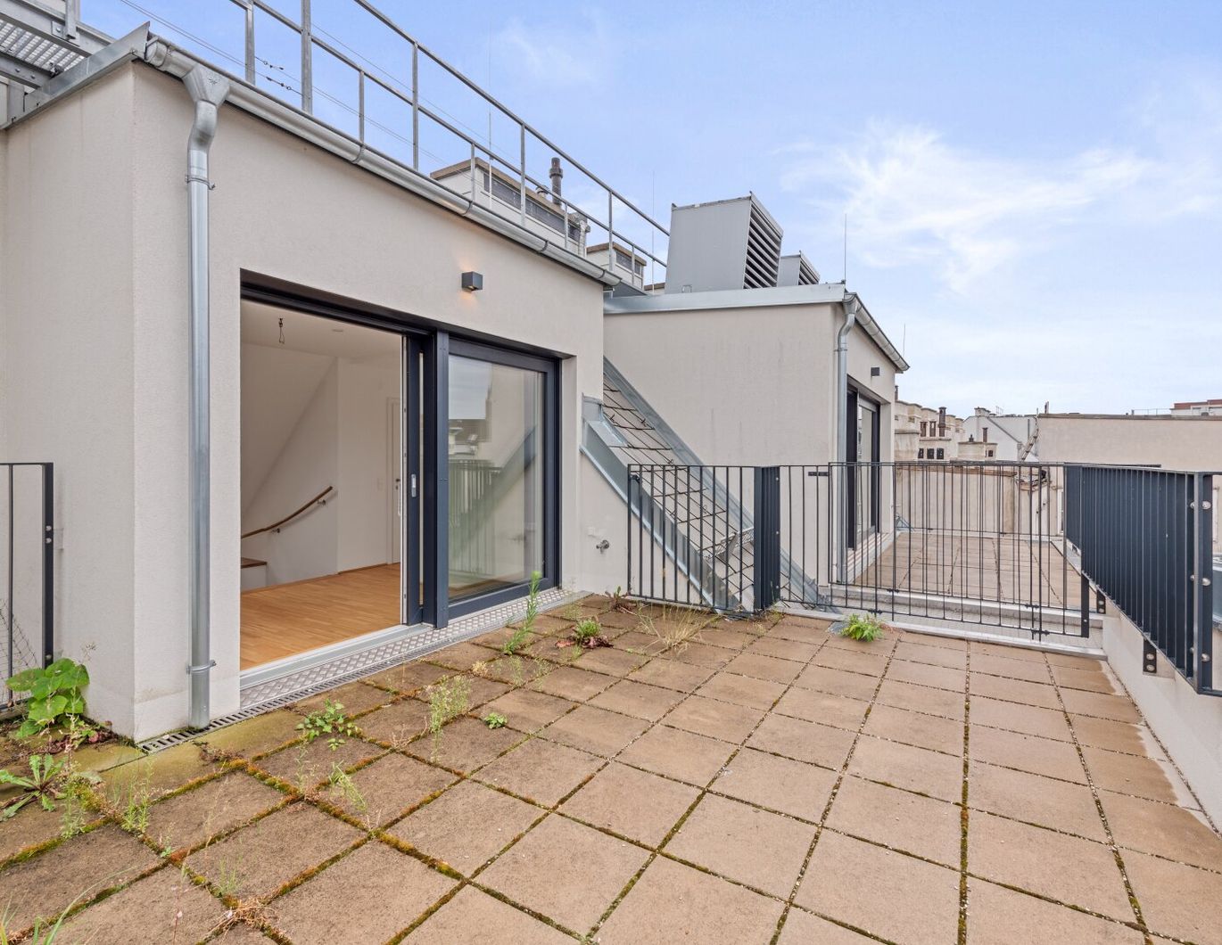 Erstbezug - Atemberaubende Dachterrasse in den Innenhof!