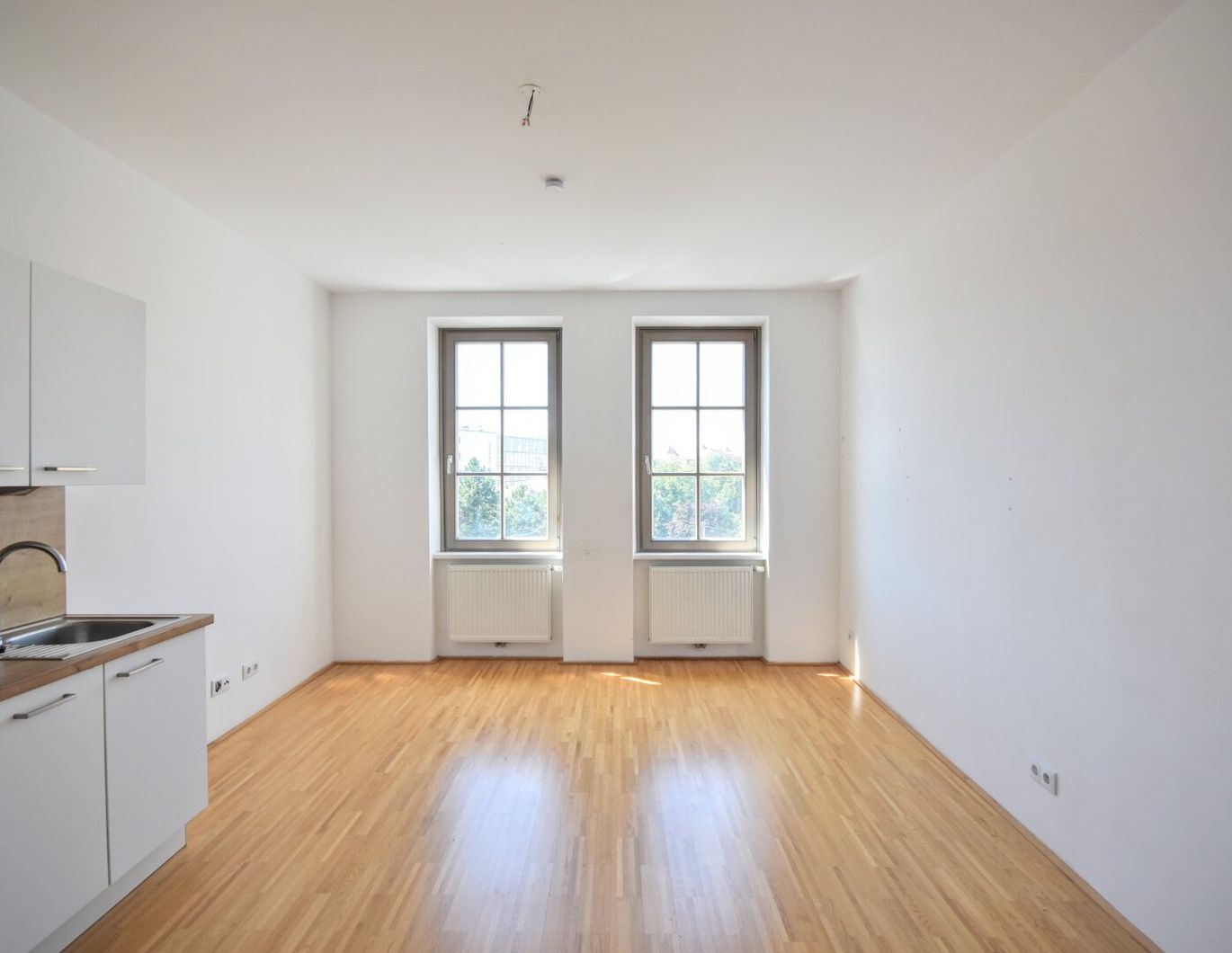 3-Zimmer-Altbau mit hofseitigem Schlafzimmer und Gemeinschaftsterrasse