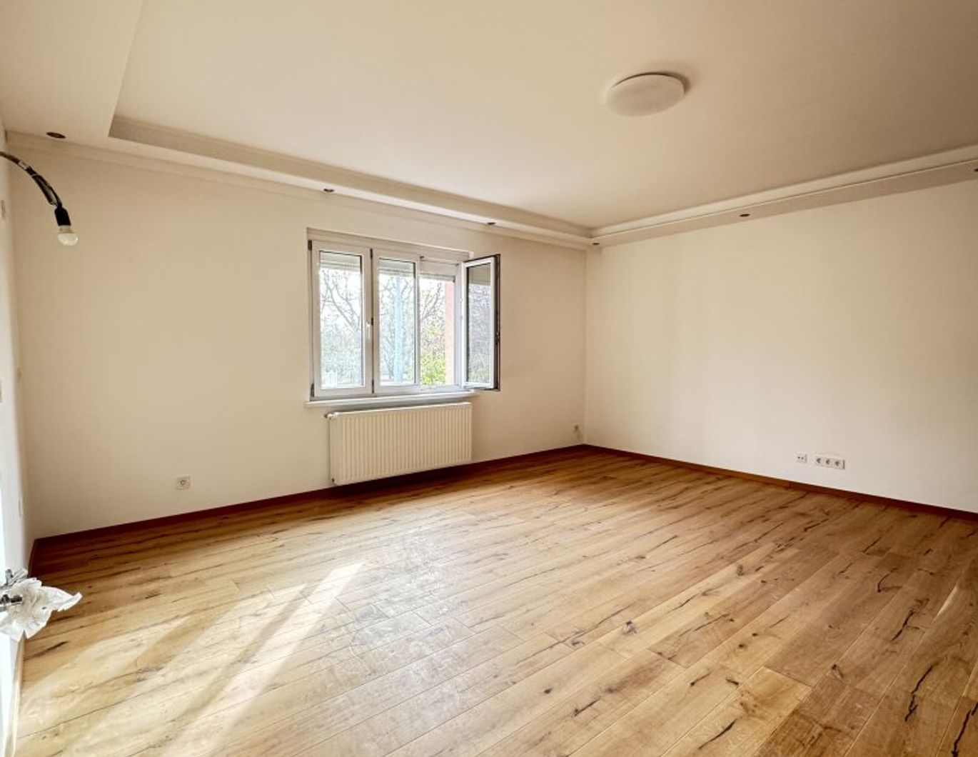 Erstbezug mit Augartenblick - Stilvolle 3-Zimmer-Wohnung mit durchdachtem Grundriss in zentraler Ruhelage