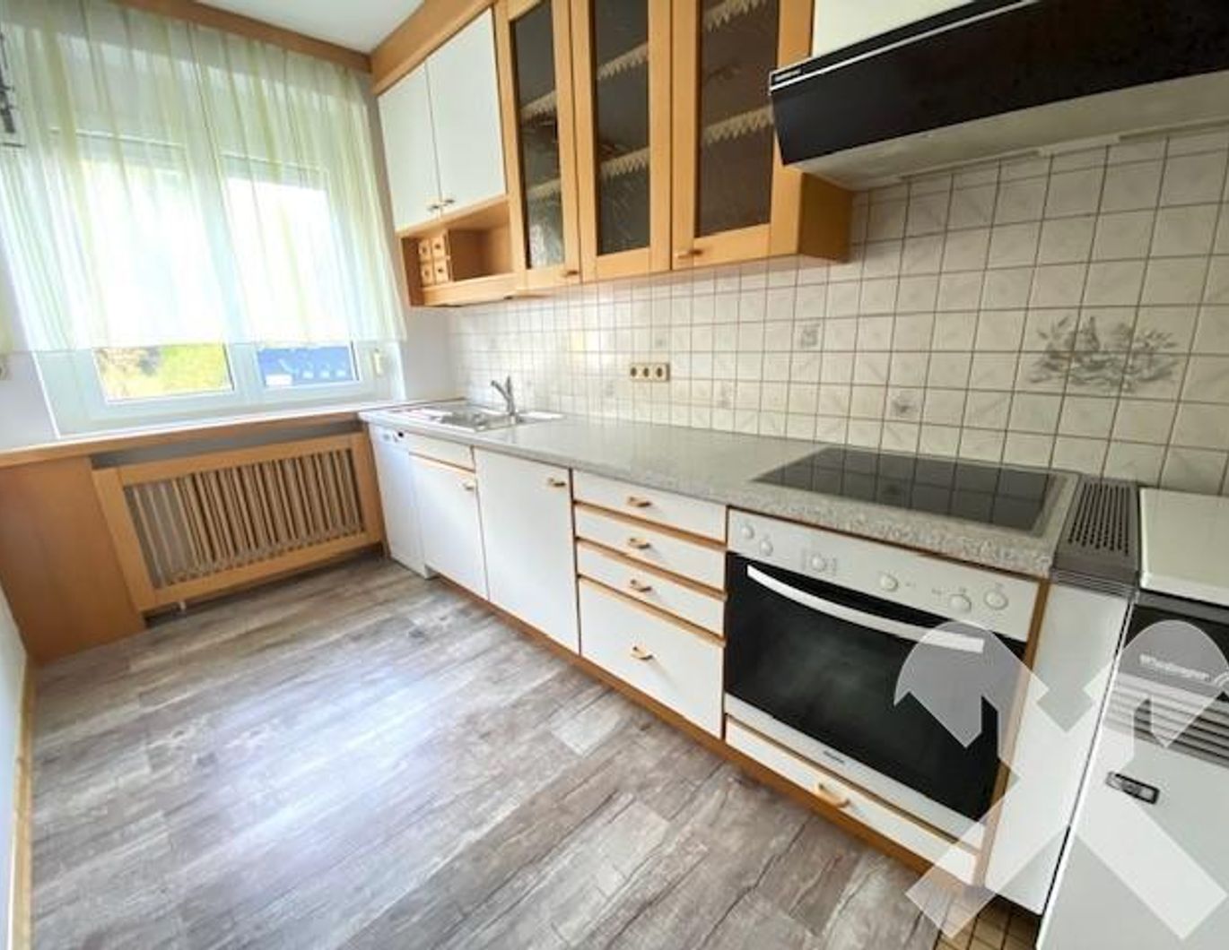 Großzügige Eigentumswohnung in der Breitenau mit Gartengrundstück und Garage